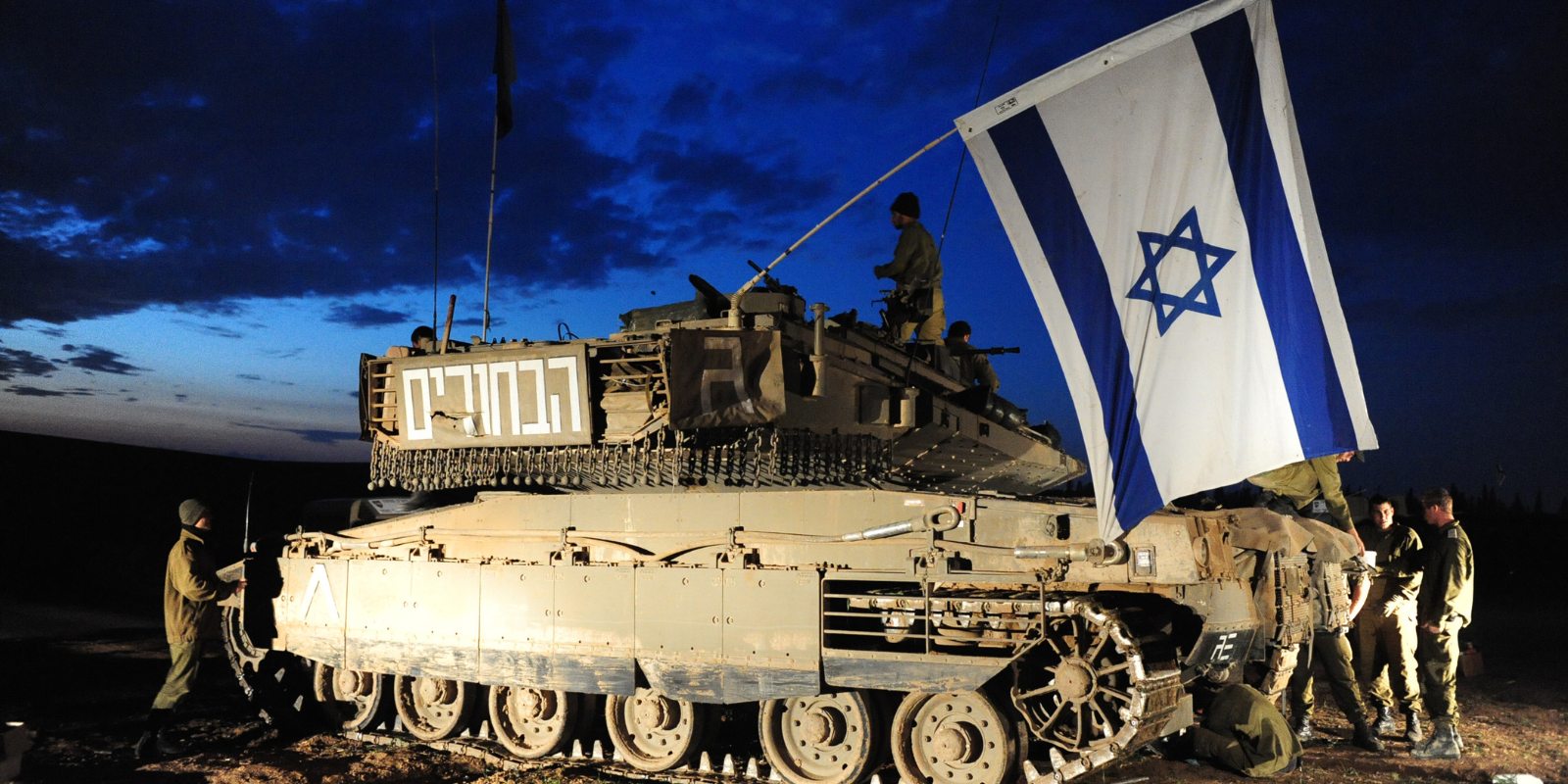 Israeli tank with Israeli flag (Shutterstock.com)