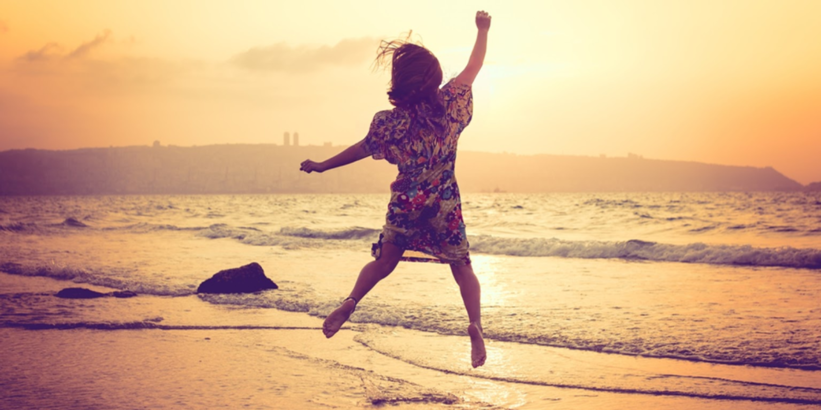 Happy girl at the beach in Israel (Shutterstock.com)