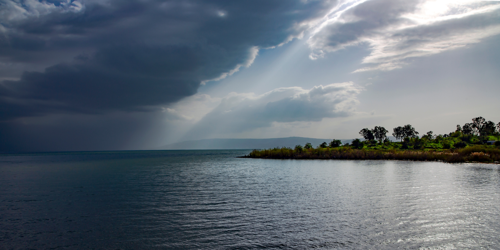 A light in the storm over the Sea of Galilee (Shutterstock.com)