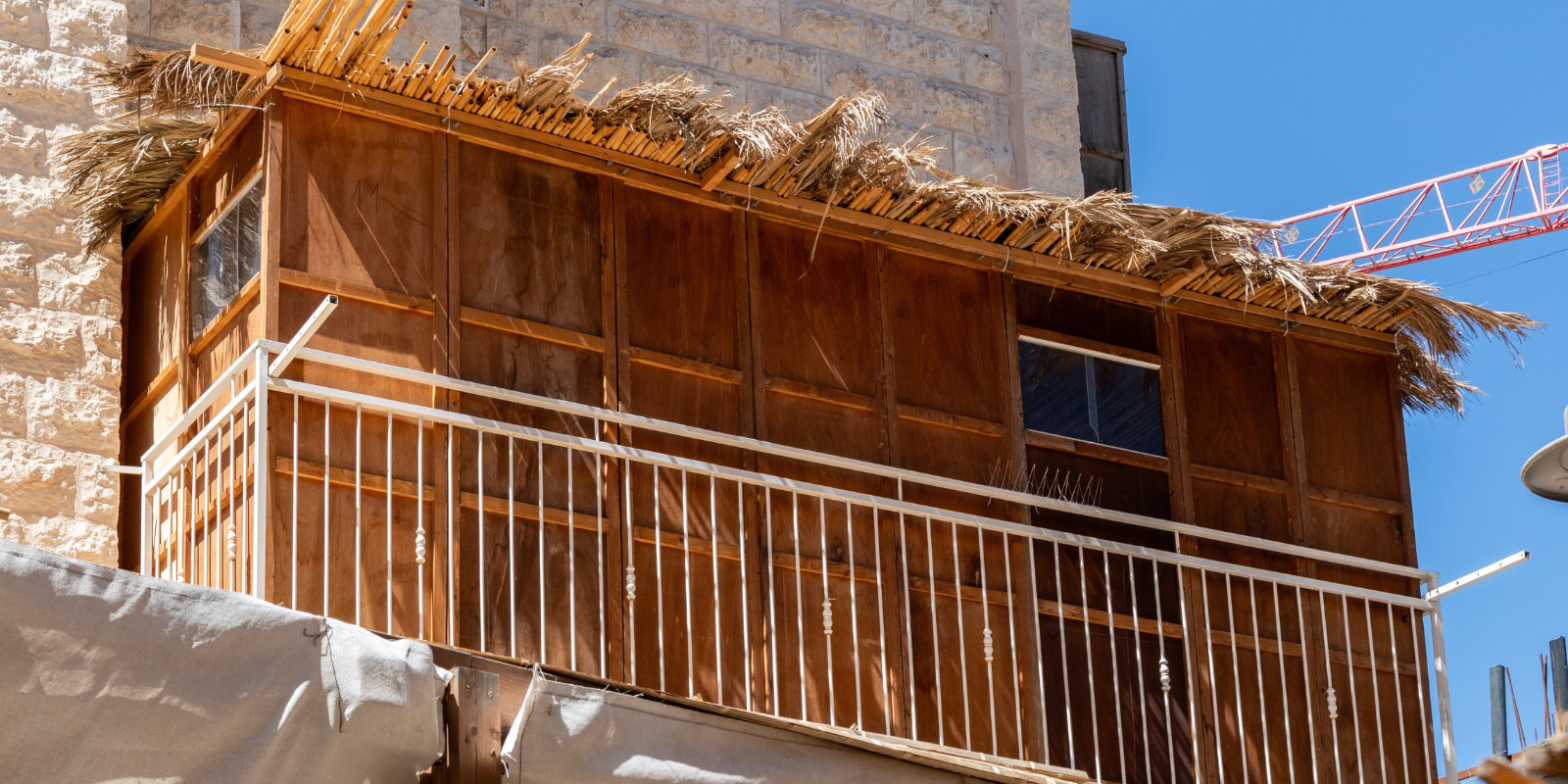 A sukkah on a balcony in Jerusalem (Shutterstock.com)