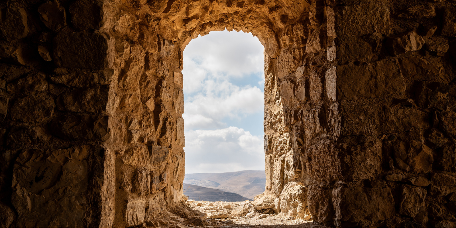 A view of the Israeli desert through the window of a Crusader fortress (Shutterstock)
