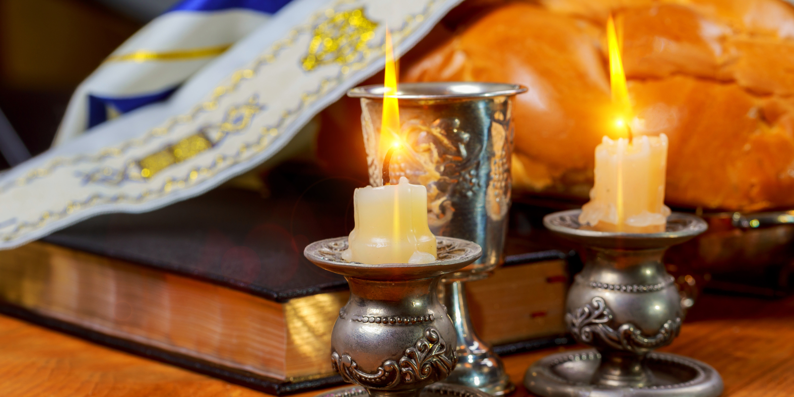 Traditional Shabbat candles burning (Shutterstock)