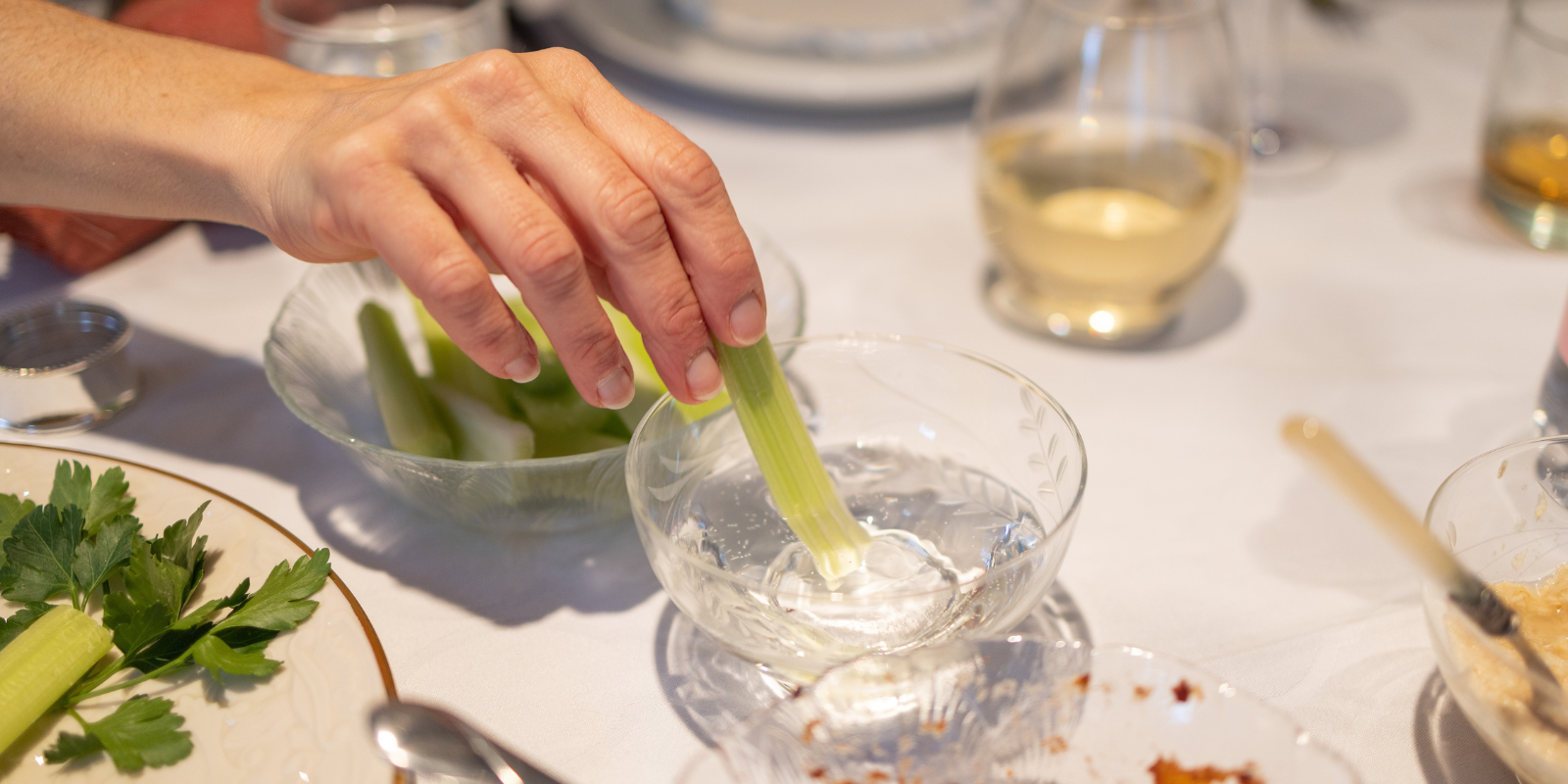 Karpas - Dipping a vegetable in saltwater at the Passover seder (Shutterstock)