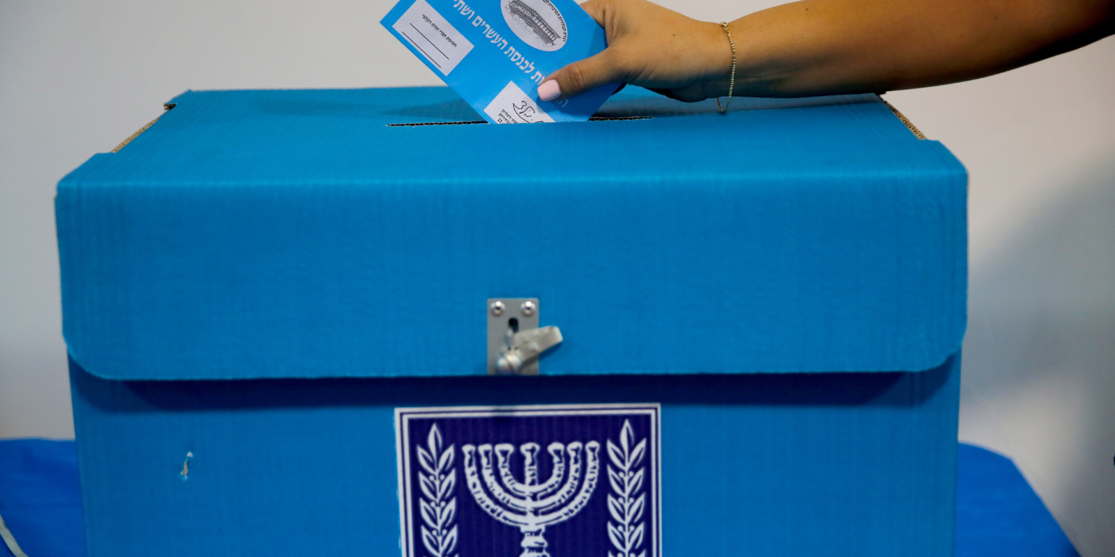 Ballot and ballot paper for Israeli elections at the Israeli Central Elections Committee Logistics Center in Shoham, Israel (Gil Cohen Magen, Shutterstock.com)